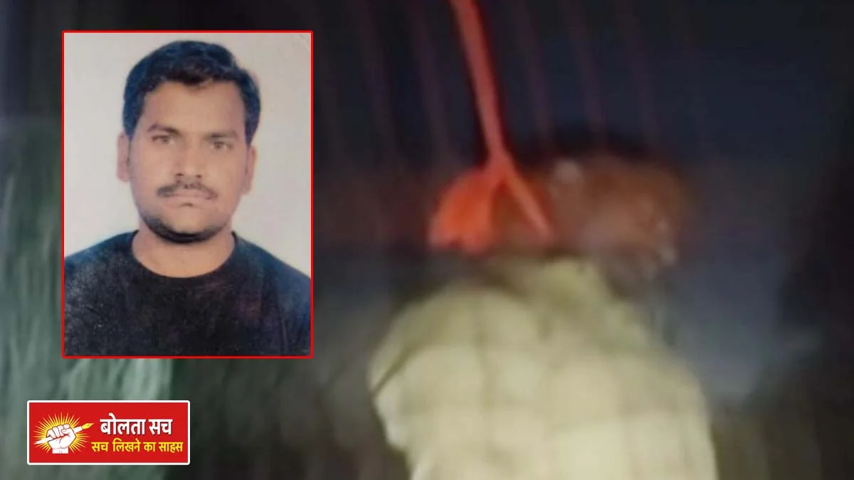 hanging from a railway signal pole